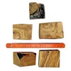 Several pieces of wood with distinct grain patterns are arranged on a white background, with a ruler for scale. Produktbild-Vorschau
