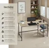 A computer desk with a monitor, keyboard, mouse, books, and a printer, set up in a home office environment. Náhled obrázku produktu