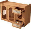A wooden cat furniture piece with multiple compartments, drawers, and openings. Produktbild-Vorschau