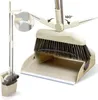 A close-up view of a dustpan and brush set with a telescopic handle, showcasing its features. Náhľad obrázku produktu