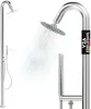 A stainless steel outdoor shower with a rain shower head and a handheld shower head, with water spraying from the rain shower head. Produktbild-Vorschau