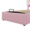 Close-up view of the side of a pink upholstered bed frame, showing the slatted mattress base and a black metal handle. Produktbild-Vorschau