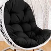 A close-up of a black cushion inside a white hanging chair. Produktbild-Vorschau