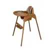 A brown plastic high chair with a tray and safety straps, shown against a white background. Produktbild-Vorschau