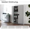 A metal filing cabinet with its doors open, filled with binders, in an office setting. Produktbild-Vorschau