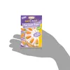 A hand is holding a package of marzipan carrots. Produktbild-Vorschau