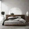 A bedroom scene with a bed, mirror, and decorative items. Produktbild-Vorschau