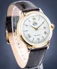 A close-up shot of a gold-colored men's watch with a white face and a brown leather strap. Produktbild-Vorschau