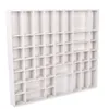 A white wooden storage box with many compartments. Produktbild-Vorschau