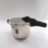 A stainless steel pressure cooker is shown against a white background. Podgląd zdjęcia produktu