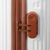 A close-up view of a suitcase zipper and combination lock. Náhľad obrázku produktu