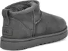 A single gray UGG boot is shown from the side. Voir les images du produit