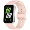 A pink smartwatch with a silver casing is shown against a white background. The watch face displays the time, date, and fitness metrics. Produktbild-Vorschau