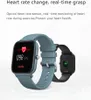 Two smartwatches are displayed, one blue and one black, with a focus on the blue one showing its heart rate monitoring feature. Náhled obrázku produktu