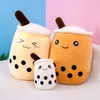 Three plush toys shaped like bubble tea cups are arranged on a surface. Produktbild-Vorschau