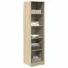 A tall, narrow wooden shelf unit with several shelves, some of which contain folded clothes and a storage box. Voir les images du produit