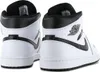 A pair of white and black Nike Air Jordan sneakers shown from the back. Anteprima dell’immagine prodotto