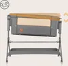 A baby crib with adjustable height settings shown in a diagram. Produktbild-Vorschau