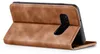 A brown flip cover case for a smartphone is shown from the side, propped open. Produktbild-Vorschau