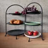 A tiered serving stand with various food items on display. Produktbild-Vorschau