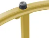 A close-up view of a gold-colored metal table leg and a black rubber foot. Náhled obrázku produktu