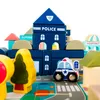 A close-up view of a toy city made of wooden blocks, featuring a police station, hospital, and other buildings, along with a toy police car and trees. Anteprima dell’immagine prodotto