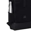 A close-up view of a black backpack with a silver water bottle in a side pocket. Anteprima dell’immagine prodotto