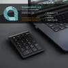 A wireless numpad is shown next to a laptop, with marketing text and compatibility information. Náhled obrázku produktu