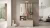 A hallway furniture set with a mirror, coat hooks, and storage, set in a modern home interior. Náhľad obrázku produktu