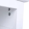 A close-up view of the corner of a white furniture piece, showing two silver screws embedded in the surface. The focus is on the joinery detail. Anteprima dell’immagine prodotto
