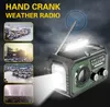 A hand-crank weather radio is shown with multiple inset images depicting various weather emergencies. Podgląd zdjęcia produktu