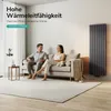 A couple relaxing on a sofa in a modern living room with a vertical radiator. Náhľad obrázku produktu
