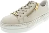 A single beige sneaker with gold accents is shown against a white background. Náhled obrázku produktu