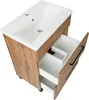A top-down view of a bathroom vanity with a ceramic sink and wooden cabinet. The drawers are partially open, revealing white interior compartments. Podgląd zdjęcia produktu