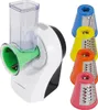 A white electric grater with multiple colored attachments. Náhľad obrázku produktu