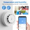 A smart smoke detector with temperature and humidity sensors, shown mounted on a wall, with accompanying graphics and a smartphone displaying app information. Podgląd zdjęcia produktu