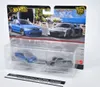A Hot Wheels Premium Car Culture Zestaw 2 Aut Audi S4 quattro i Audi R8 LMS JDY82 toy car set in its packaging. Voir les images du produit