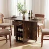 A dining table set up in a room with a window and curtains. Náhľad obrázku produktu