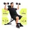 A man is using a weight bench with dumbbells, with feature callouts. Produktbild-Vorschau