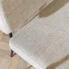 Close-up view of the textured fabric of a bench seat and backrest, with a dark metal leg visible. Produktbild-Vorschau
