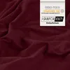 A close-up of a wrinkled, dark red fabric, likely a bedsheet, with a label attached. Produktbild-Vorschau