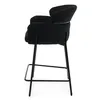 A side view of a black upholstered bar stool with a metal frame. Produktbild-Vorschau