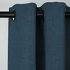 Close-up view of a blue curtain with grommets hanging on a black curtain rod. Produktbild-Vorschau