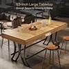 A bar table with stools in a modern setting, possibly a home bar or lounge. Voir les images du produit