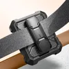 A close-up shot of a black phone case clip attached to a gray and brown belt. Produktbild-Vorschau