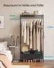A SONGMICS open wardrobe with clothes hanging on it, and storage drawers below, placed in a bedroom setting. Produktbild-Vorschau
