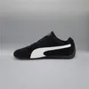 A single black Puma Speedcat OG sneaker is shown against a plain gray background. Voir les images du produit