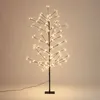 A decorative LED tree with warm white lights against a plain background. Náhled obrázku produktu