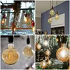 A collage of four images showing vintage Edison-style LED light bulbs in various settings, including indoors and outdoors. Produktbild-Vorschau