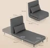 A dark gray sofa bed is shown in two configurations, with dimensions indicated by measurement lines and text. Anteprima dell’immagine prodotto